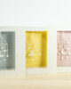 PALUXA_Mobile_3_Varianten_stehend.jpg Drei Farbvarianten PALUXA Lasercut-Babykarte mit Mobile-Motiv, stehend.