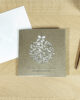 PALUXA_Florale_Weihnachtskugel_Brownsilver_birdview.jpg PALUXA Lasercut-Weihnachtskarte mit floralem Weihnachtskugel Motiv, liegend, Farbe Brownsilver.