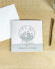 PALUXA_Schneekugel_Dorf_Silber_birdview.jpg PALUXA Lasercut-Weihnachtskarte mit Schneekugel Motiv, liegend, Farbe Silber.